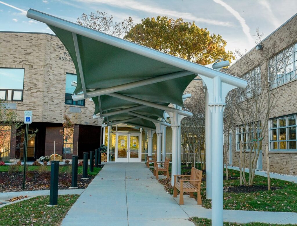 properly maintained awning over a walkway providing shade